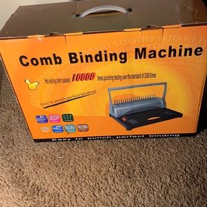 Comb binding machine